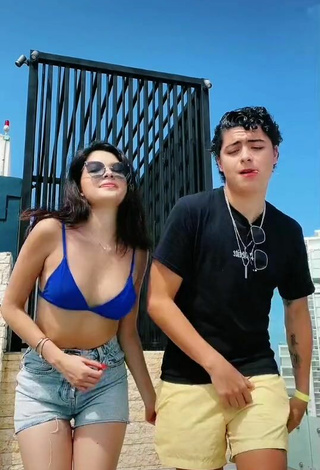 Titillating Michelle Mendizábal in Blue Bikini Top