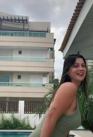 5. Sultry Nina Castanheira Shows Cleavage in Olive Swimsuit and Bouncing Boobs