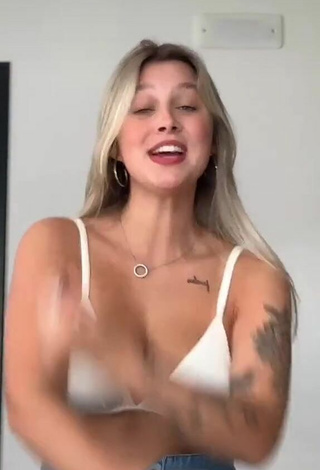 2. Sultry Nina Castanheira Shows Cleavage in White Bikini Top and Bouncing Tits