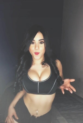 2. Luscious Ónice Flores Shows Cleavage in Black Sport Bra