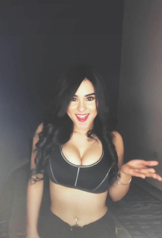 3. Luscious Ónice Flores Shows Cleavage in Black Sport Bra