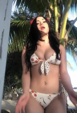 5. Luscious Ónice Flores Shows Cleavage in Floral Bikini and Bouncing Tits