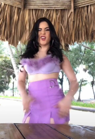 4. Sultry Ónice Flores Shows Cleavage in Purple Crop Top