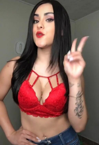 2. Luscious Ónice Flores Shows Cleavage in Red Bra