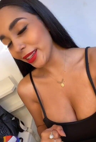 2. Hot Pao Castillo Shows Cleavage in Black Top