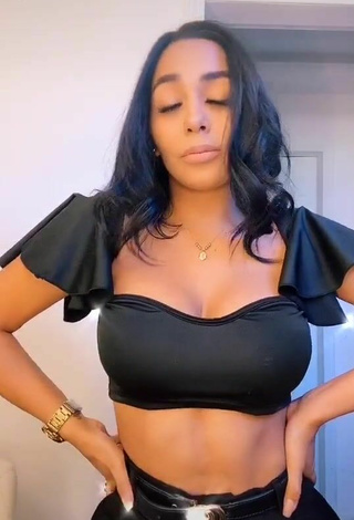 2. Hot Pao Castillo Shows Cleavage in Black Crop Top