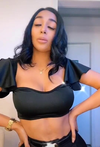 5. Hot Pao Castillo Shows Cleavage in Black Crop Top