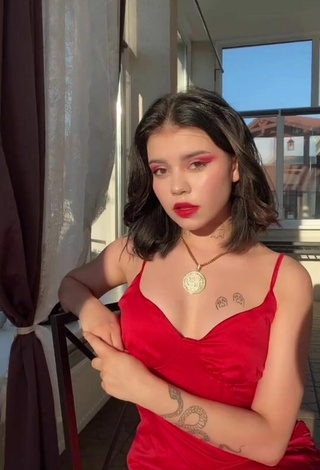 Sultry Regina Isaenko in Red Dress