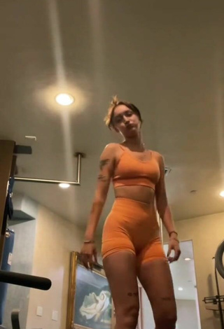 4. Sultry Rhegan Coursey in Orange Sport Bra