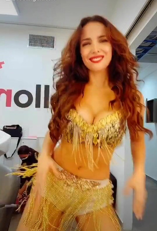 2. Luscious Rosángela Espinoza Shows Cleavage in Golden Bra