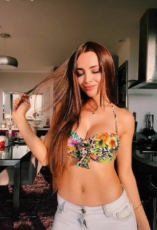 Erotic Rosángela Espinoza Shows Cleavage in Floral Bikini Top