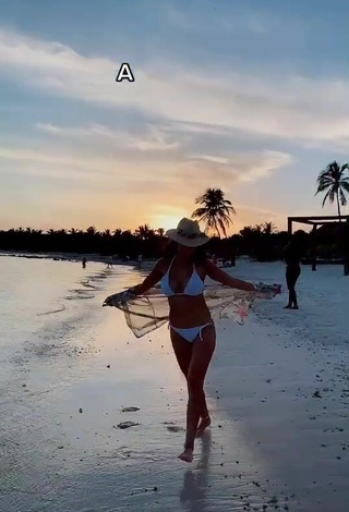 3. Lovely Rosángela Espinoza Shows Cleavage in White Bikini at the Beach