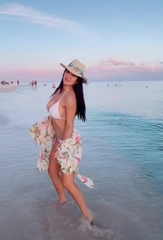 5. Lovely Rosángela Espinoza Shows Cleavage in White Bikini at the Beach