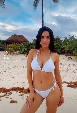 3. Erotic Rosángela Espinoza Shows Cleavage in White Bikini at the Beach