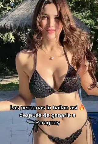 2. Hot Rosángela Espinoza Shows Cleavage in Black Bikini at the Pool