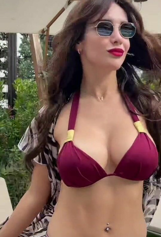 Sultry Rosángela Espinoza Shows Cleavage in Red Bikini at the Pool