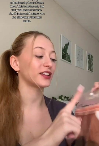 3. Titillating Sophia Diamond Shows Cleavage in Grey Top