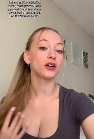 4. Titillating Sophia Diamond Shows Cleavage in Grey Top