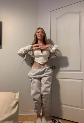 2. Luscious Sophia Diamond Shows Cleavage in White Crop Top