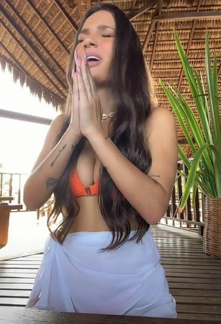 2. Sultry Stéfani Bays Shows Cleavage in Orange Bikini Top