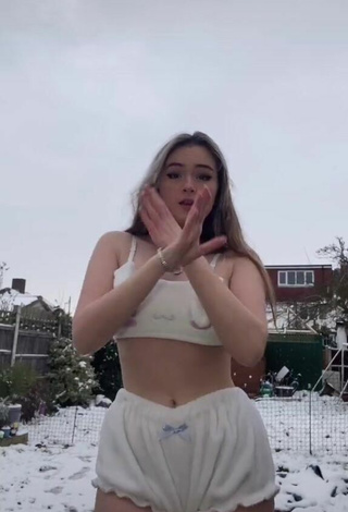 2. Sultry Tamzin Taber in White Crop Top