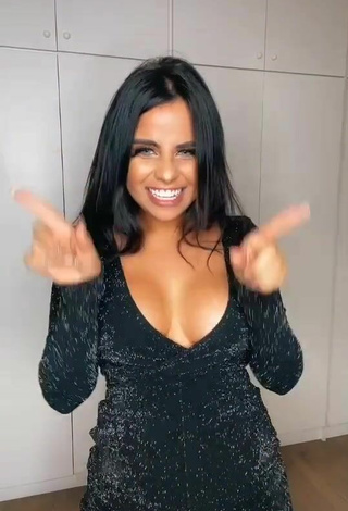 5. Sultry Tati Nunes Shows Cleavage in Black Overall and Bouncing Breasts