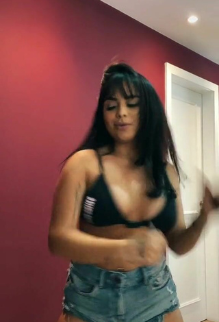 4. Sultry Tati Nunes Shows Cleavage in Black Bikini Top and Bouncing Boobs