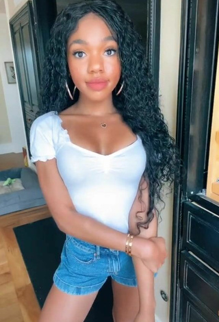 Sexy Teala Dunn Shows Cleavage in White Top