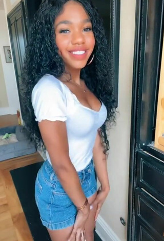 2. Sexy Teala Dunn Shows Cleavage in White Top