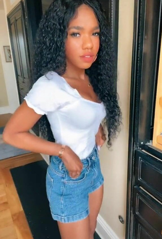 4. Sexy Teala Dunn Shows Cleavage in White Top