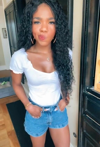 5. Sexy Teala Dunn Shows Cleavage in White Top