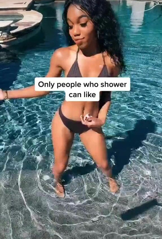 4. Teala Dunn in Inviting Black Bikini at the Pool