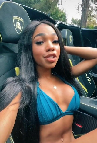 Luscious Teala Dunn Shows Cleavage in Blue Bikini Top in a Car