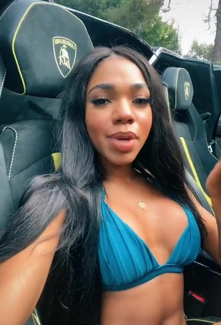 3. Luscious Teala Dunn Shows Cleavage in Blue Bikini Top in a Car