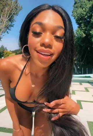 2. Teala Dunn Looks Cute in Black Bikini