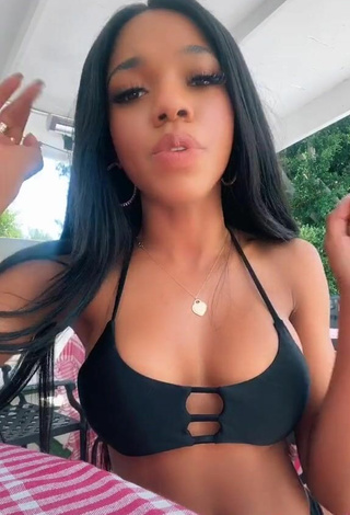 5. Sexy Teala Dunn Shows Cleavage in Black Bikini Top