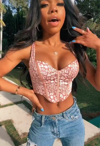 3. Sultry Teala Dunn Shows Cleavage in Leopard Crop Top