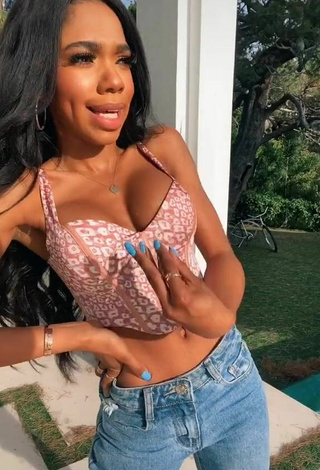 4. Sultry Teala Dunn Shows Cleavage in Leopard Crop Top