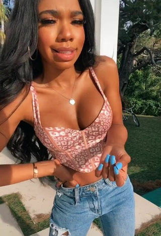 5. Sultry Teala Dunn Shows Cleavage in Leopard Crop Top