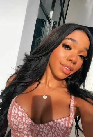 3. Sweetie Teala Dunn Shows Cleavage in Leopard Crop Top