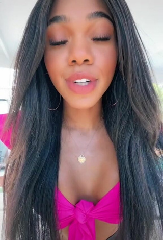 Titillating Teala Dunn Shows Cleavage in Firefly Rose Crop Top