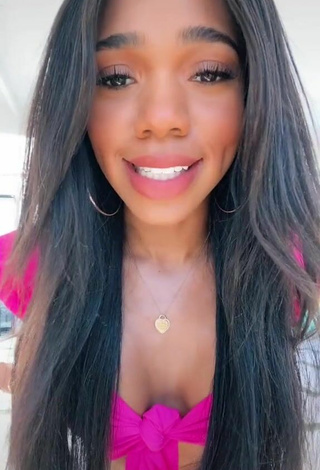 2. Titillating Teala Dunn Shows Cleavage in Firefly Rose Crop Top