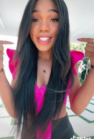 4. Titillating Teala Dunn Shows Cleavage in Firefly Rose Crop Top