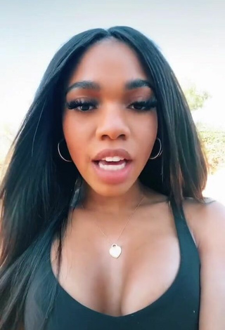 2. Luscious Teala Dunn Shows Cleavage in Black Top