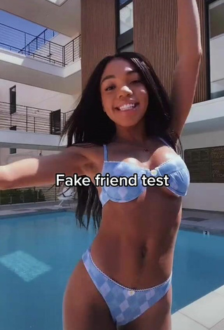 Luscious Teala Dunn Shows Cleavage in Floral Bikini at the Pool