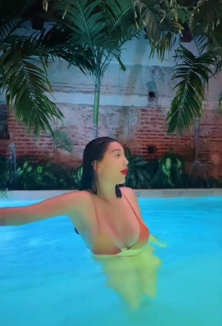 Sultry Valentina Gómez Shows Cleavage in Orange Bikini Top at the Pool