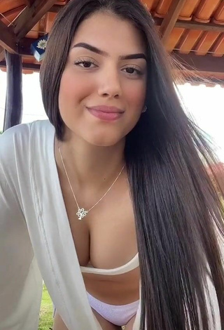 Sultry Victtoria Medeiros Shows Cleavage in White Bikini and Bouncing Boobs