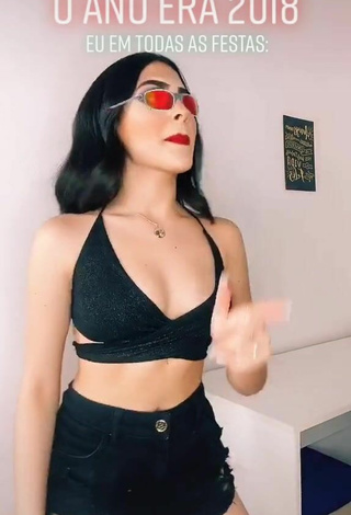 3. Luscious Vivi Shows Cleavage in Black Crop Top