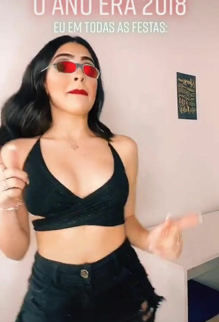 4. Luscious Vivi Shows Cleavage in Black Crop Top