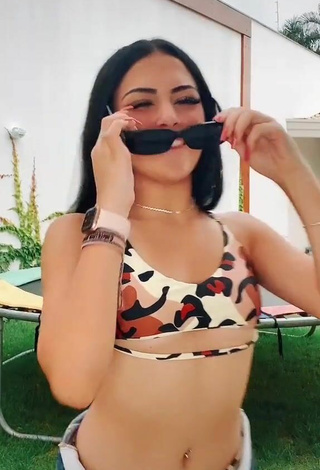 3. Luscious Vivi in Leopard Bikini Top